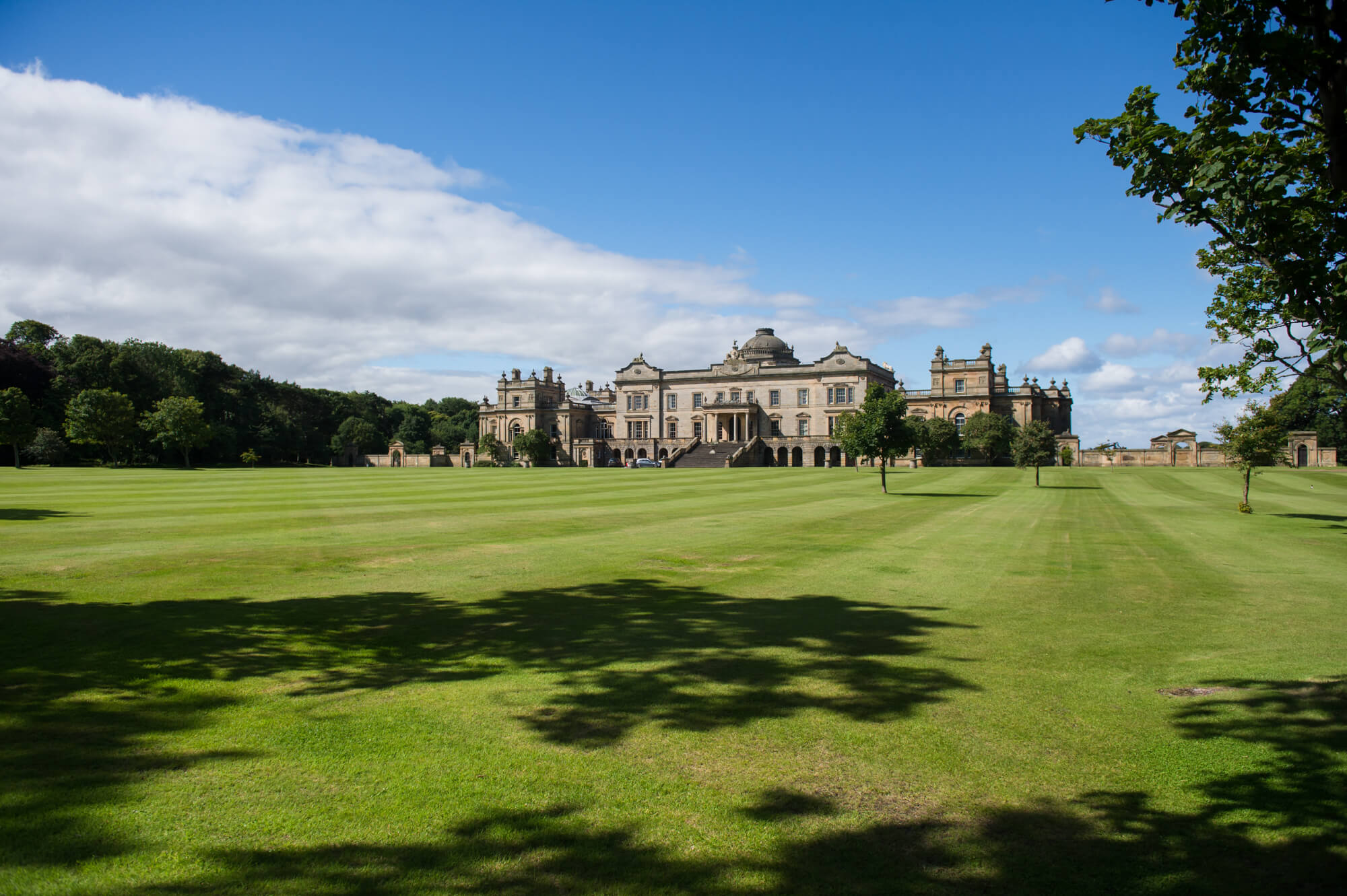 A photo of Gosford House in Scotland with blue skies and beautiful sunshine